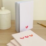 Carnet rosé aux 3 cœurs